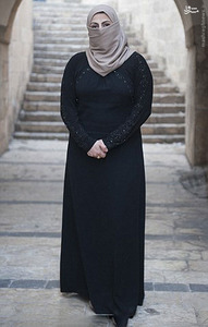 حَربه زن داعشی برای فرار از اعدام/عکس