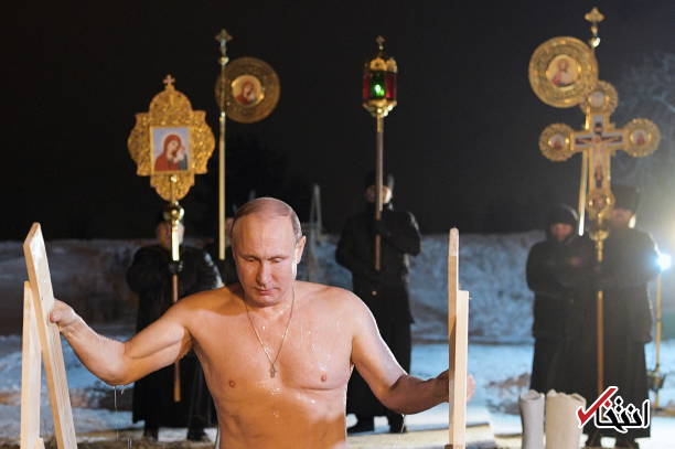 عکس/ غسل تعمید ولادیمیر پوتین در آب یخ‌زده