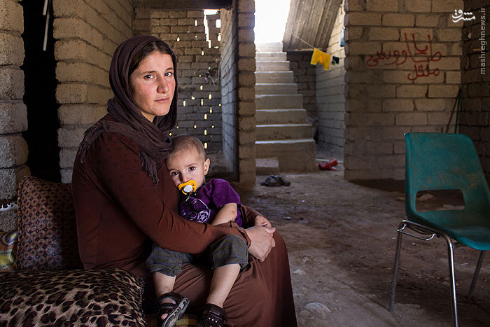 عکس/داعش این زن باردار را ۱۲دلار فروخت