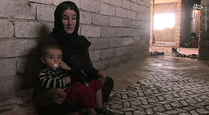 عکس/داعش این زن باردار را ۱۲دلار فروخت