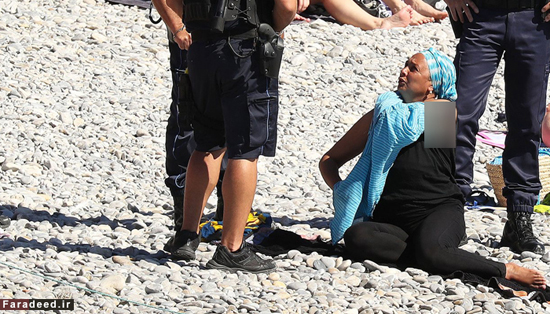 حرکت زننده پلیس با خانم محجبه در کنار دریا