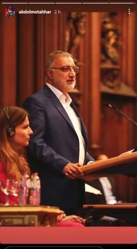 زاکانی کنار یک زن بی‌حجاب