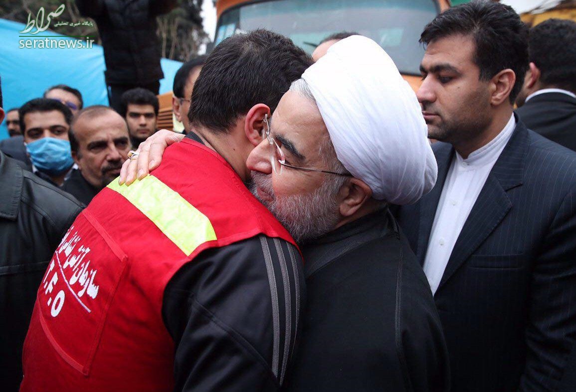 عکس/ یک آتش نشان در آغوش روحانی