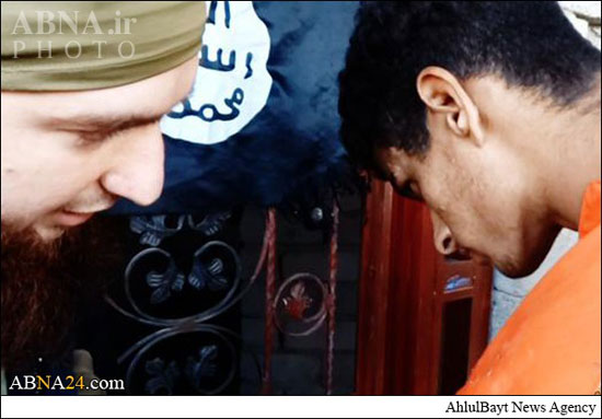 تصاویر ذبح سرباز عراقی توسط داعش (18+) تصاویر ذبح سرباز عراقی توسط داعش (18+)