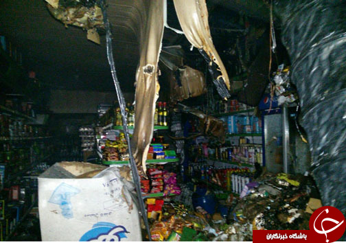 خسارت ميليونی در اثر آتش سوزی فروشگاه مواد غذايی +تصاویر